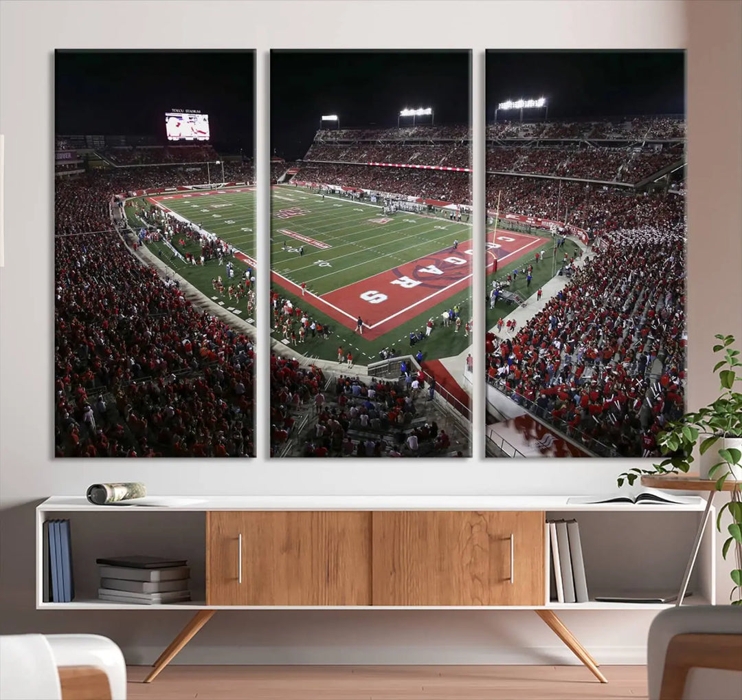 The Houston Cougars Football Team Print, showcasing the stunning TDECU Stadium during a night game, is elegantly displayed on premium canvas triptych wall art with a gallery-quality finish.