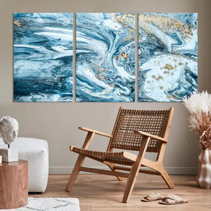 An eye-catching abstract wall art piece titled "Ice Blue Marble Fluid Effect" comes in a three-panel canvas. It is crafted on museum-quality polycotton canvas and features a UV-protective coating, making it an elegant addition to any living space.