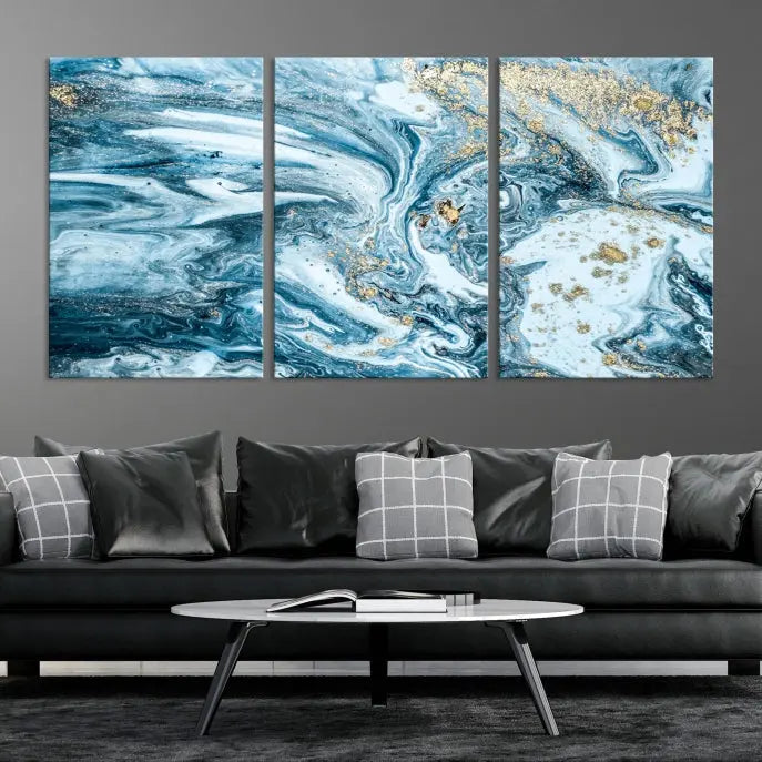 An eye-catching abstract wall art piece titled "Ice Blue Marble Fluid Effect" comes in a three-panel canvas. It is crafted on museum-quality polycotton canvas and features a UV-protective coating, making it an elegant addition to any living space.