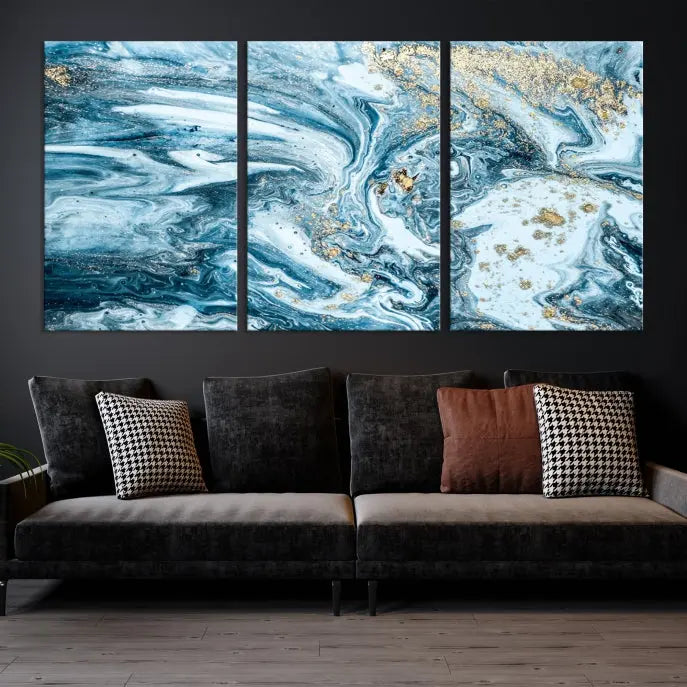 An eye-catching abstract wall art piece titled "Ice Blue Marble Fluid Effect" comes in a three-panel canvas. It is crafted on museum-quality polycotton canvas and features a UV-protective coating, making it an elegant addition to any living space.