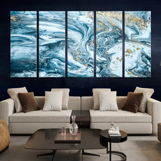 An eye-catching abstract wall art piece titled "Ice Blue Marble Fluid Effect" comes in a three-panel canvas. It is crafted on museum-quality polycotton canvas and features a UV-protective coating, making it an elegant addition to any living space.