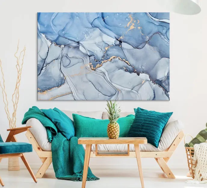 The "Ice Blue Marble Fluid Effect" abstract canvas wall art print, featuring a three-panel design, adorns the wall.