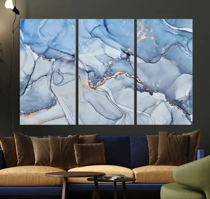 The "Ice Blue Marble Fluid Effect" abstract canvas wall art print, featuring a three-panel design, adorns the wall.