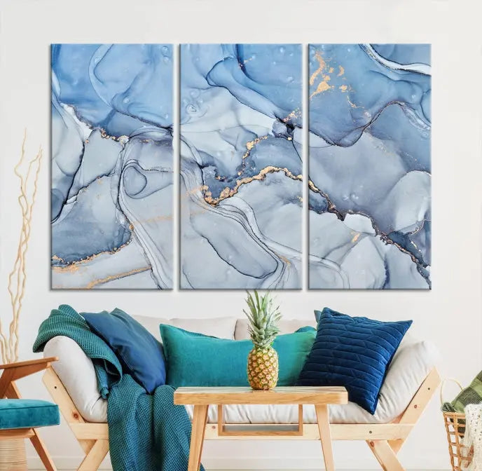 The "Ice Blue Marble Fluid Effect" abstract canvas wall art print, featuring a three-panel design, adorns the wall.