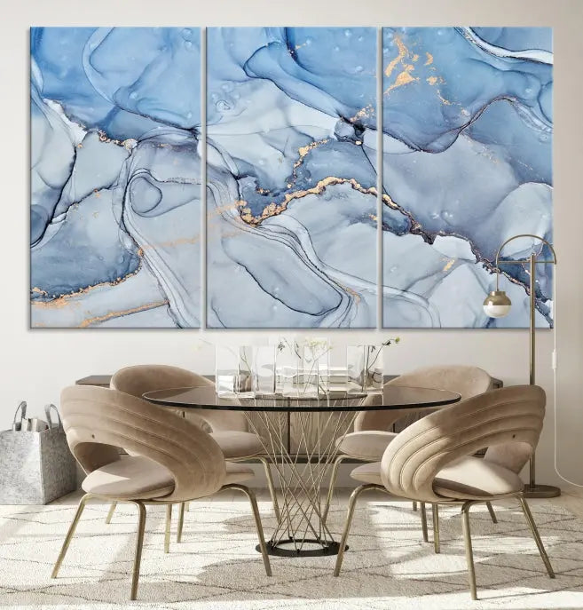 The "Ice Blue Marble Fluid Effect" abstract canvas wall art print, featuring a three-panel design, adorns the wall.