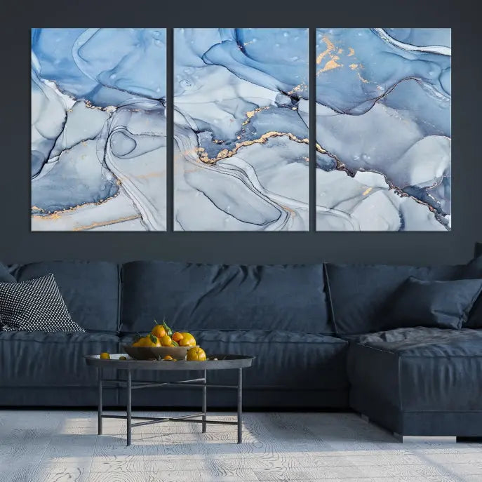 The "Ice Blue Marble Fluid Effect" abstract canvas wall art print, featuring a three-panel design, adorns the wall.