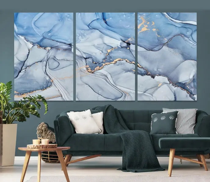 The "Ice Blue Marble Fluid Effect" abstract canvas wall art print, featuring a three-panel design, adorns the wall.