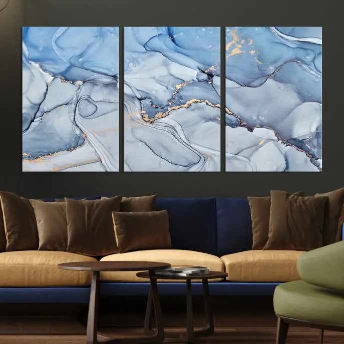 The "Ice Blue Marble Fluid Effect" abstract canvas wall art print, featuring a three-panel design, adorns the wall.