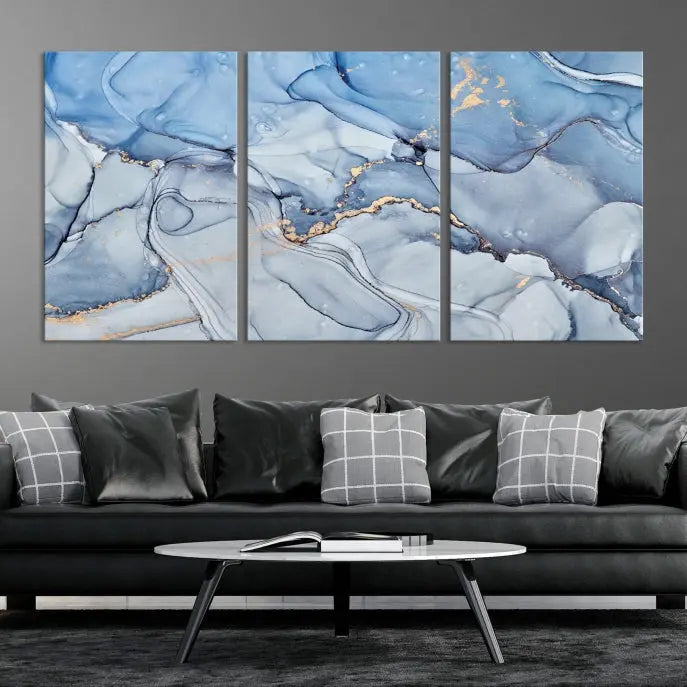 The "Ice Blue Marble Fluid Effect" abstract canvas wall art print, featuring a three-panel design, adorns the wall.