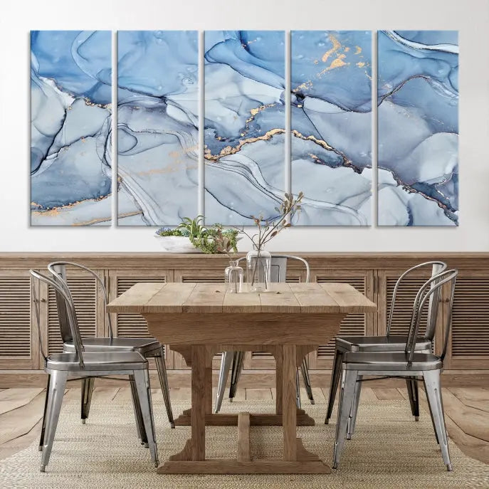 The "Ice Blue Marble Fluid Effect" abstract canvas wall art print, featuring a three-panel design, adorns the wall.