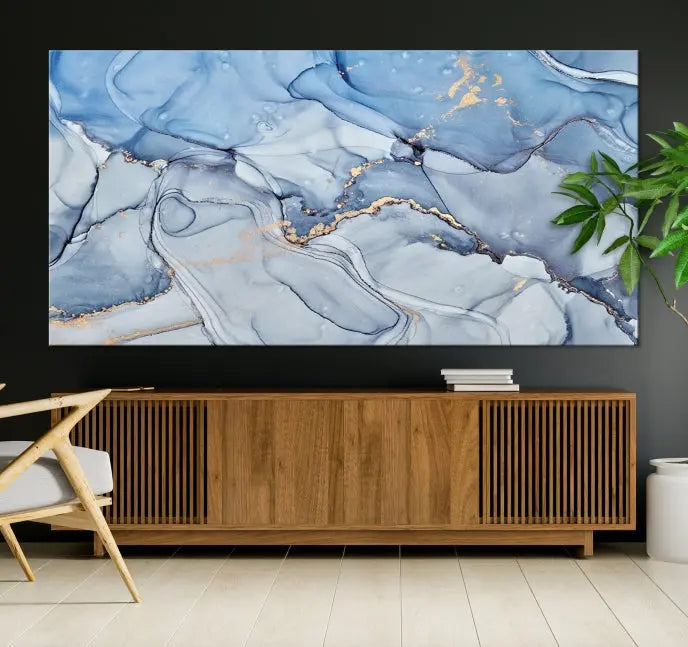 The Ice Blue Marble Fluid Effect Wall Art Abstract Canvas Wall Art Print adds an elegant touch to the room. These gallery-wrapped, museum-quality canvases are finished with a UV-protective coating, ensuring lasting vibrancy and allure.