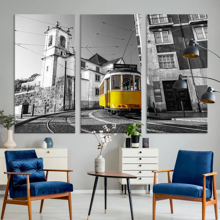 The Iconic Yellow Lisbon Tram Canvas Wall Art Print showcases a yellow tram navigating through a monochrome street scene, with a historic building in the background, exquisitely captured on museum-quality canvas.