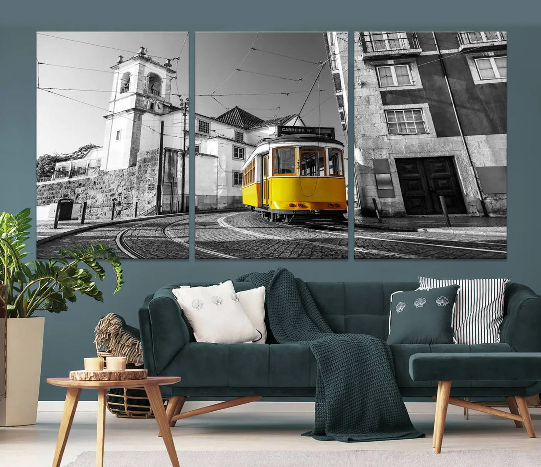 The Iconic Yellow Lisbon Tram Canvas Wall Art Print showcases a yellow tram navigating through a monochrome street scene, with a historic building in the background, exquisitely captured on museum-quality canvas.