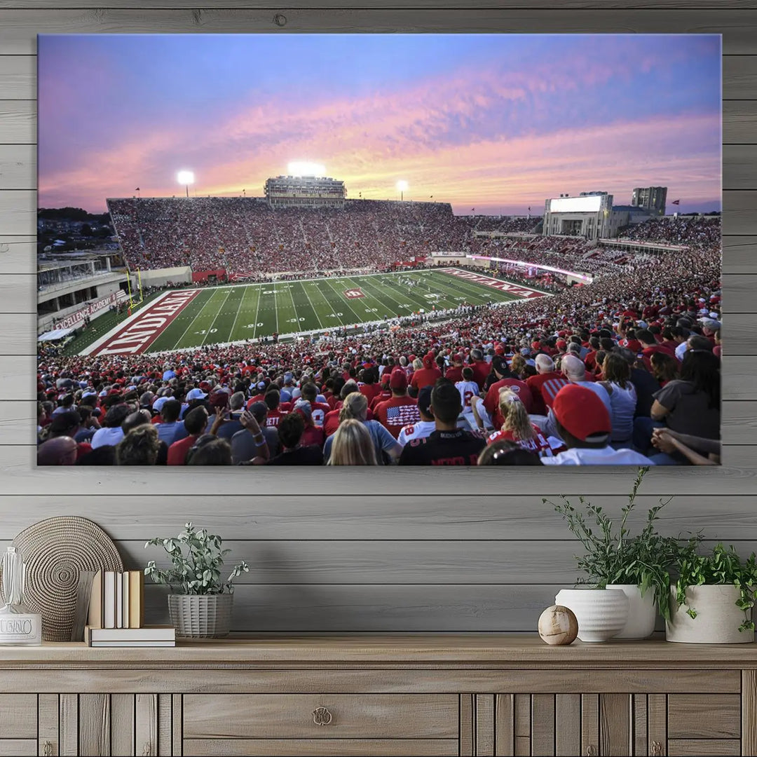 Living room featuring the Indiana University Hoosiers Football Team Print - Bloomington Memorial Stadium Wall Art Canvas Print, showcasing a packed football stadium at sunset for a gallery-quality finish.