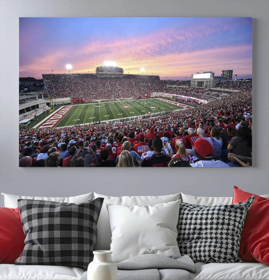 Living room featuring the Indiana University Hoosiers Football Team Print - Bloomington Memorial Stadium Wall Art Canvas Print, showcasing a packed football stadium at sunset for a gallery-quality finish.