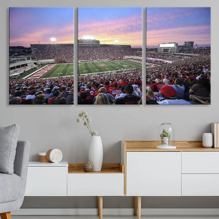 Living room featuring the Indiana University Hoosiers Football Team Print - Bloomington Memorial Stadium Wall Art Canvas Print, showcasing a packed football stadium at sunset for a gallery-quality finish.