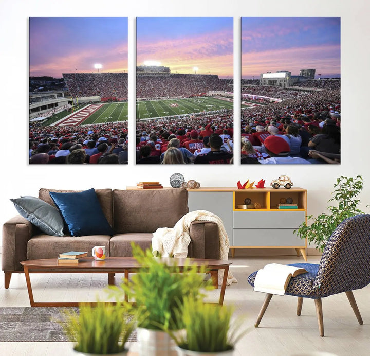 Living room featuring the Indiana University Hoosiers Football Team Print - Bloomington Memorial Stadium Wall Art Canvas Print, showcasing a packed football stadium at sunset for a gallery-quality finish.