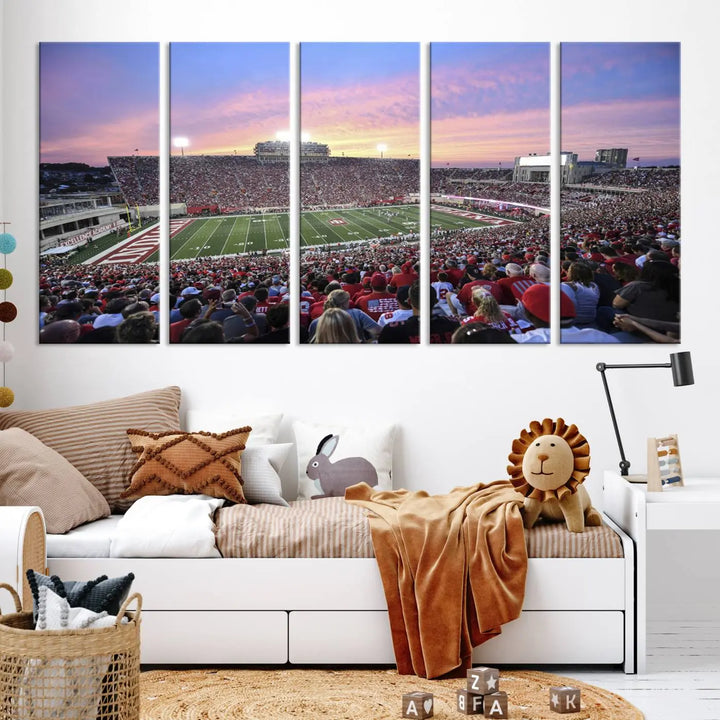 Living room featuring the Indiana University Hoosiers Football Team Print - Bloomington Memorial Stadium Wall Art Canvas Print, showcasing a packed football stadium at sunset for a gallery-quality finish.