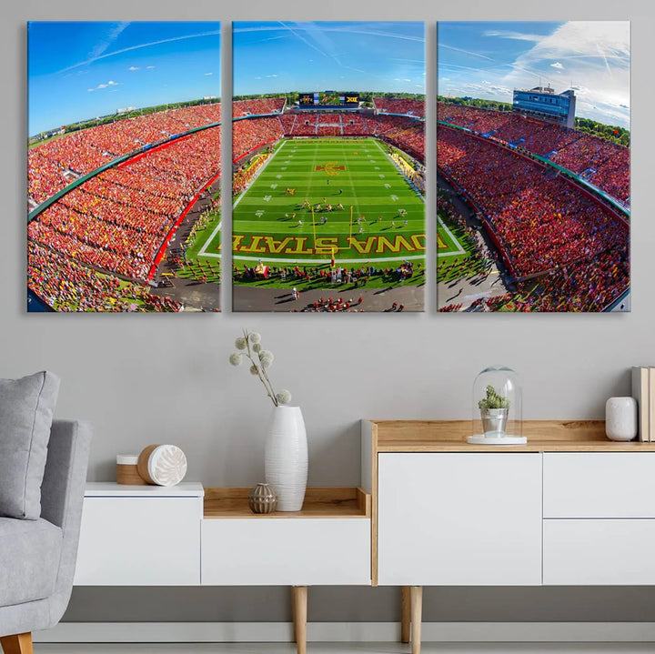 The Iowa State University Cyclones Football Team Print - Ames Jack Trice Stadium Wall Art Canvas Print features a panoramic view of a packed football stadium with vibrant red-clad fans. Handmade in the USA, this piece ensures exceptional quality and craftsmanship for your space.