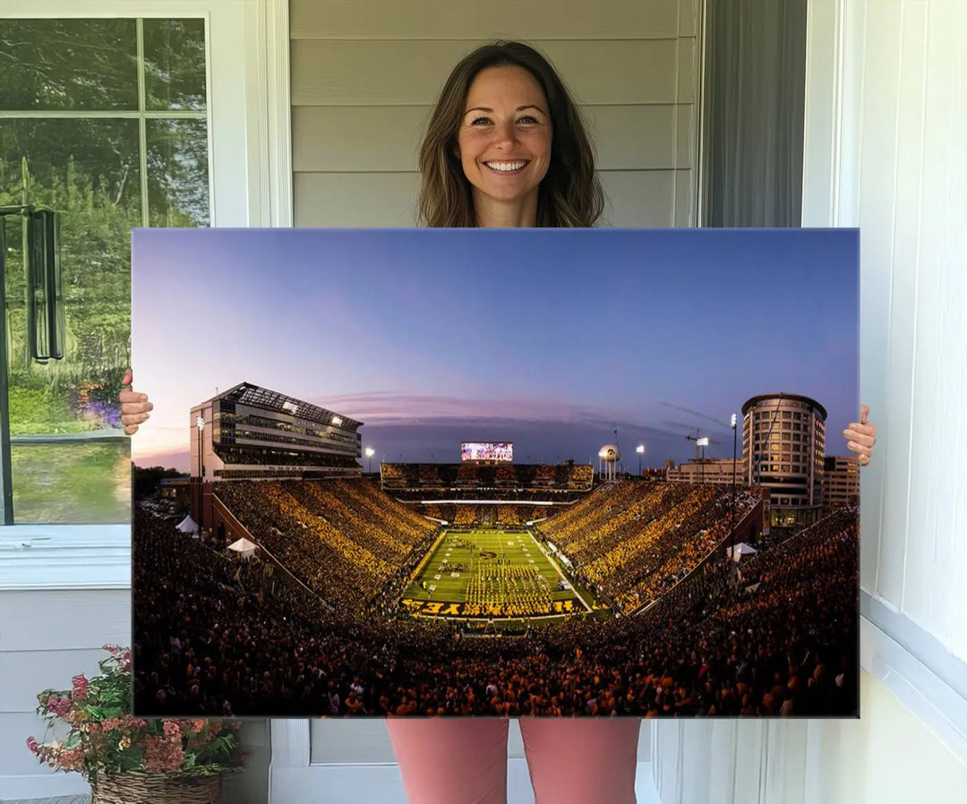 The Iowa Hawkeyes Football Team Print beautifully captures the spirit of Kinnick Stadium at dusk, highlighting the scenic skies.