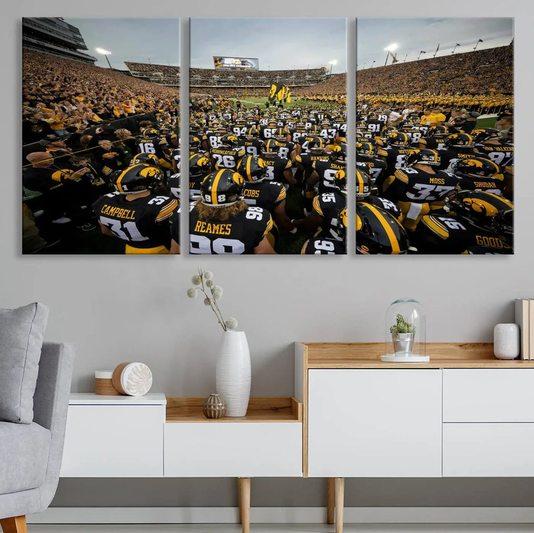 Three Iowa University Hawkeyes Football Team Prints on premium canvas showcase the dynamic energy of players and spectators at Kinnick Stadium in Iowa City, all with a gallery-quality finish.