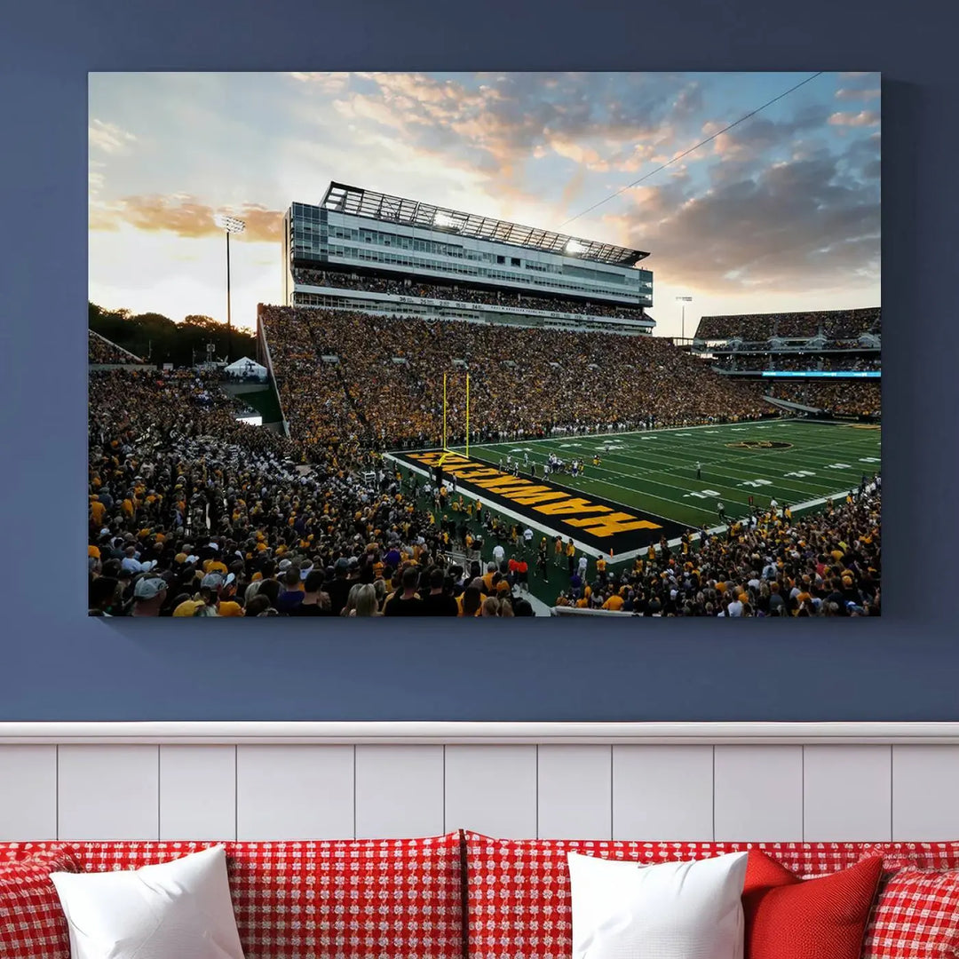 The Iowa University Hawkeyes Football Team Print, featuring a depiction of Kinnick Stadium in Iowa City at sunset and finished on a gallery-quality canvas, is displayed prominently.