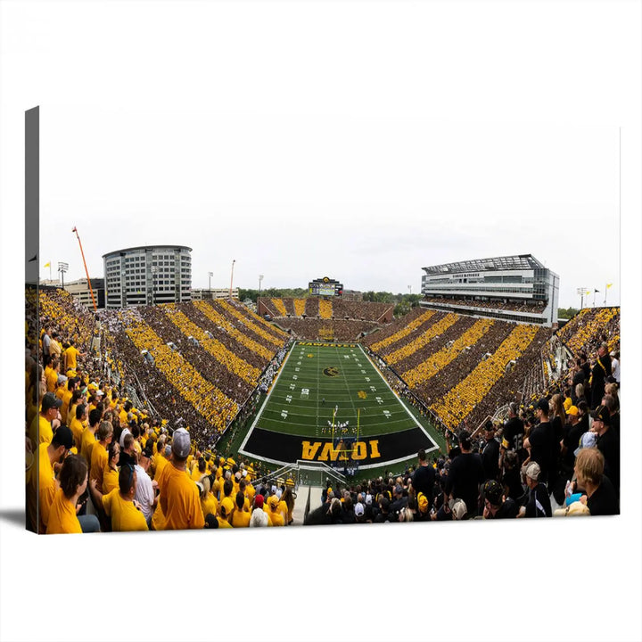 A handmade wall art print on premium canvas depicting the Iowa University Hawkeyes at a bustling Kinnick Stadium in Iowa City, capturing the vibrant scene from an end zone perspective.