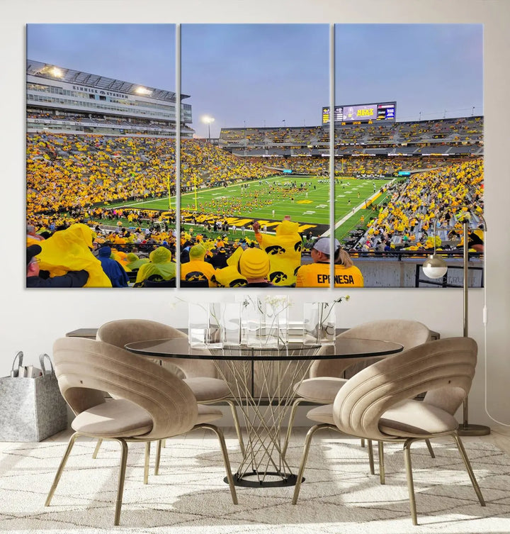 The "Iowa University Hawkeyes Football Team Print - Iowa City Kinnick Stadium Wall Art Canvas Print" captures the vibrant atmosphere of a packed Kinnick Stadium, buzzing with Iowa University Hawkeyes fans. This stunning wall art transforms the scene into a gallery-quality finish on premium canvas, bringing energy and excitement to any room.