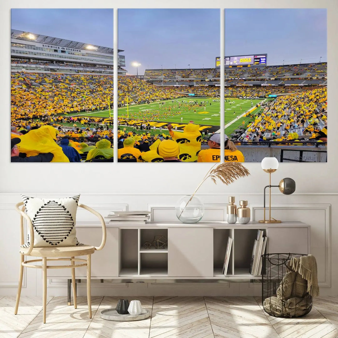 The "Iowa University Hawkeyes Football Team Print - Iowa City Kinnick Stadium Wall Art Canvas Print" captures the vibrant atmosphere of a packed Kinnick Stadium, buzzing with Iowa University Hawkeyes fans. This stunning wall art transforms the scene into a gallery-quality finish on premium canvas, bringing energy and excitement to any room.