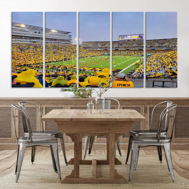 The "Iowa University Hawkeyes Football Team Print - Iowa City Kinnick Stadium Wall Art Canvas Print" captures the vibrant atmosphere of a packed Kinnick Stadium, buzzing with Iowa University Hawkeyes fans. This stunning wall art transforms the scene into a gallery-quality finish on premium canvas, bringing energy and excitement to any room.