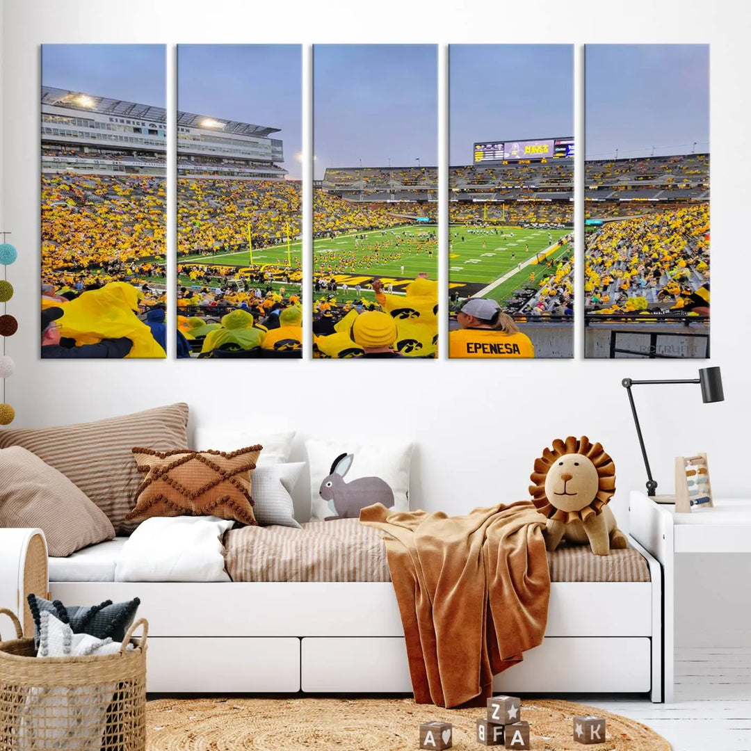 The "Iowa University Hawkeyes Football Team Print - Iowa City Kinnick Stadium Wall Art Canvas Print" captures the vibrant atmosphere of a packed Kinnick Stadium, buzzing with Iowa University Hawkeyes fans. This stunning wall art transforms the scene into a gallery-quality finish on premium canvas, bringing energy and excitement to any room.