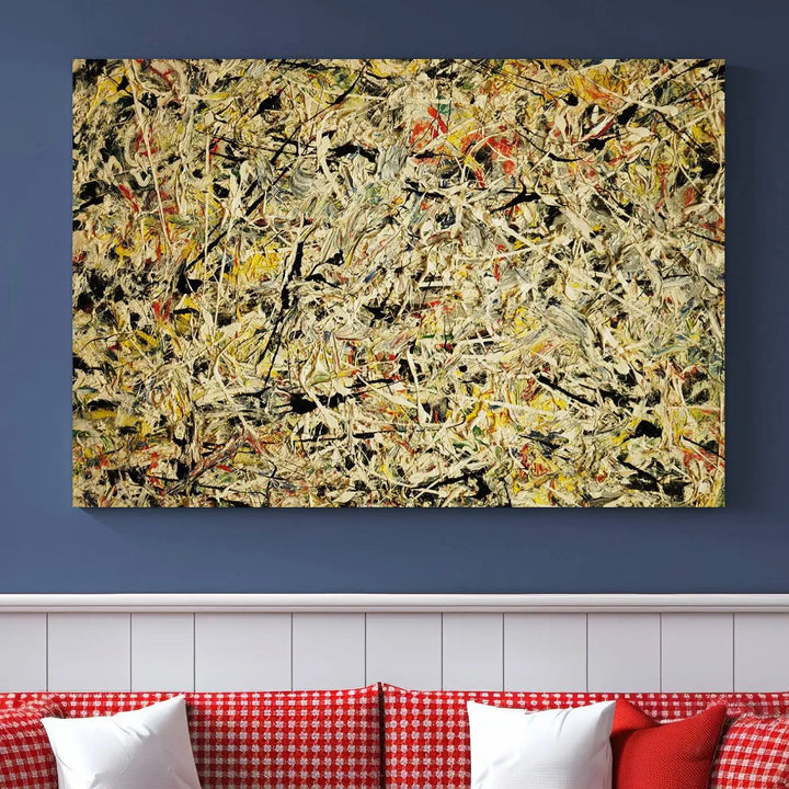 A Jackson Pollock Yellow Abstract Wall Art Canvas Print, featuring chaotic splashes of black, yellow, and red on a museum-quality canvas, is displayed prominently.