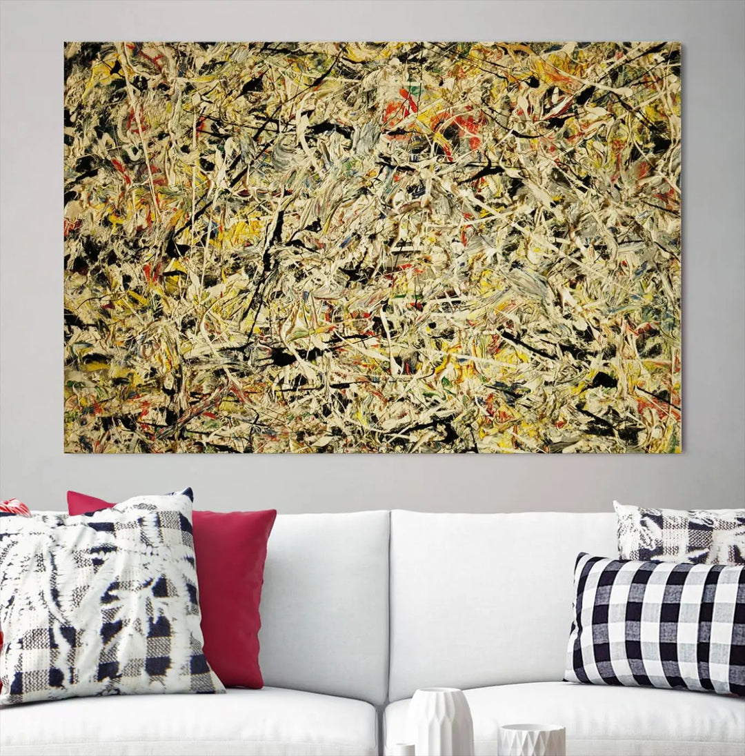 A Jackson Pollock Yellow Abstract Wall Art Canvas Print, featuring chaotic splashes of black, yellow, and red on a museum-quality canvas, is displayed prominently.