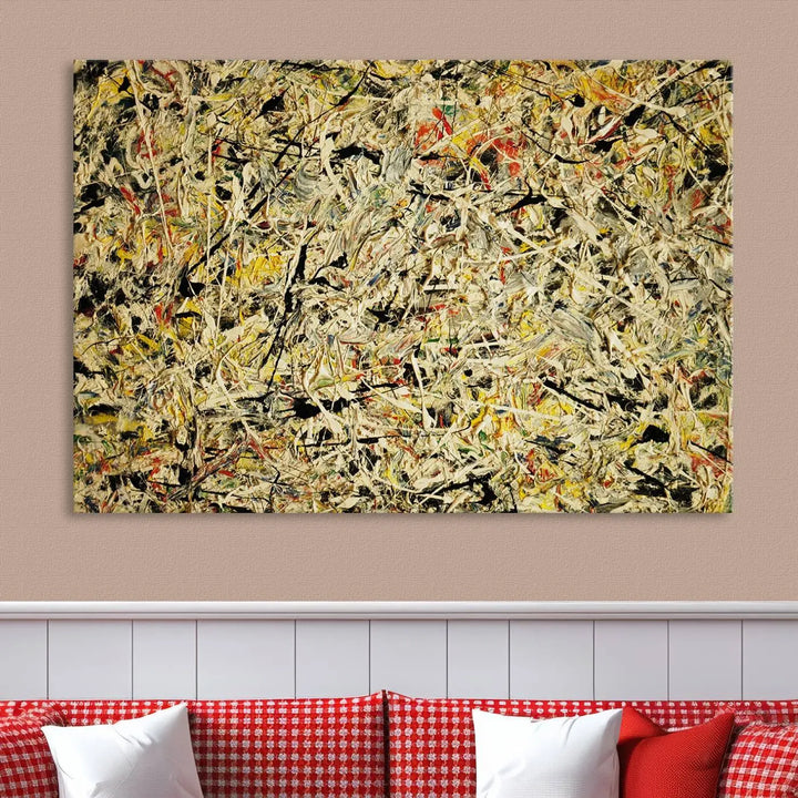 A Jackson Pollock Yellow Abstract Wall Art Canvas Print, featuring chaotic splashes of black, yellow, and red on a museum-quality canvas, is displayed prominently.