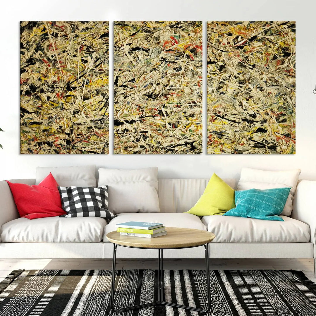 A Jackson Pollock Yellow Abstract Wall Art Canvas Print, featuring chaotic splashes of black, yellow, and red on a museum-quality canvas, is displayed prominently.