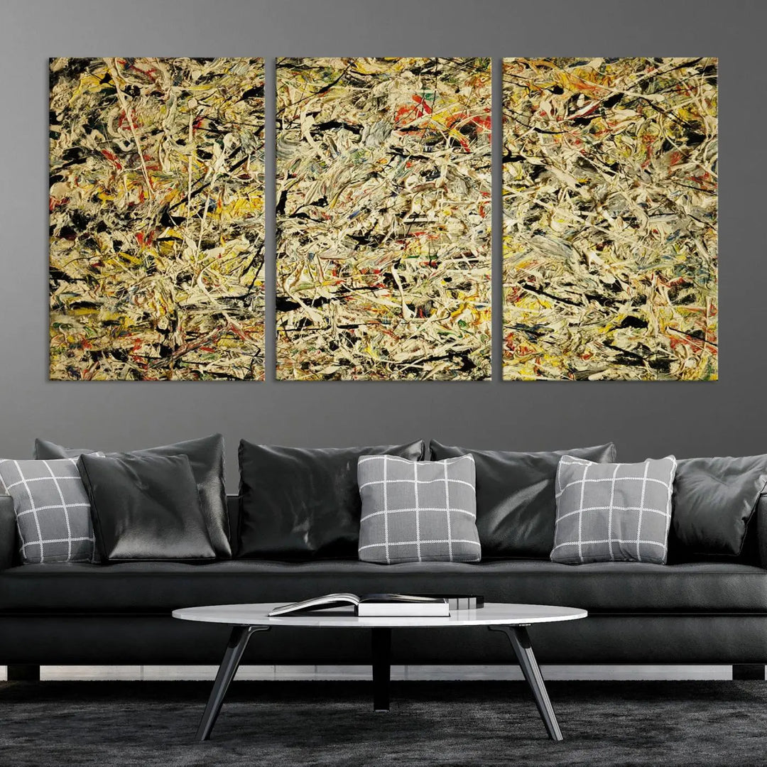 A Jackson Pollock Yellow Abstract Wall Art Canvas Print, featuring chaotic splashes of black, yellow, and red on a museum-quality canvas, is displayed prominently.