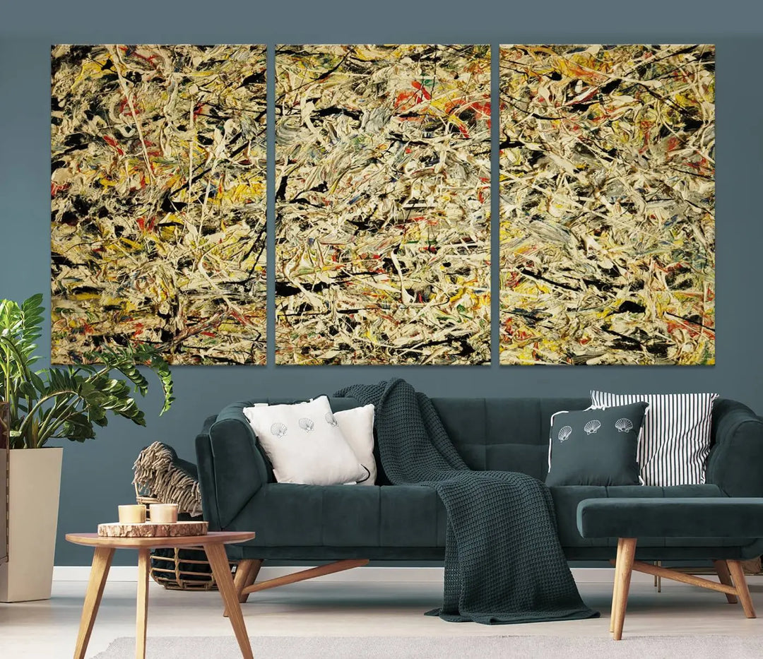 A Jackson Pollock Yellow Abstract Wall Art Canvas Print, featuring chaotic splashes of black, yellow, and red on a museum-quality canvas, is displayed prominently.