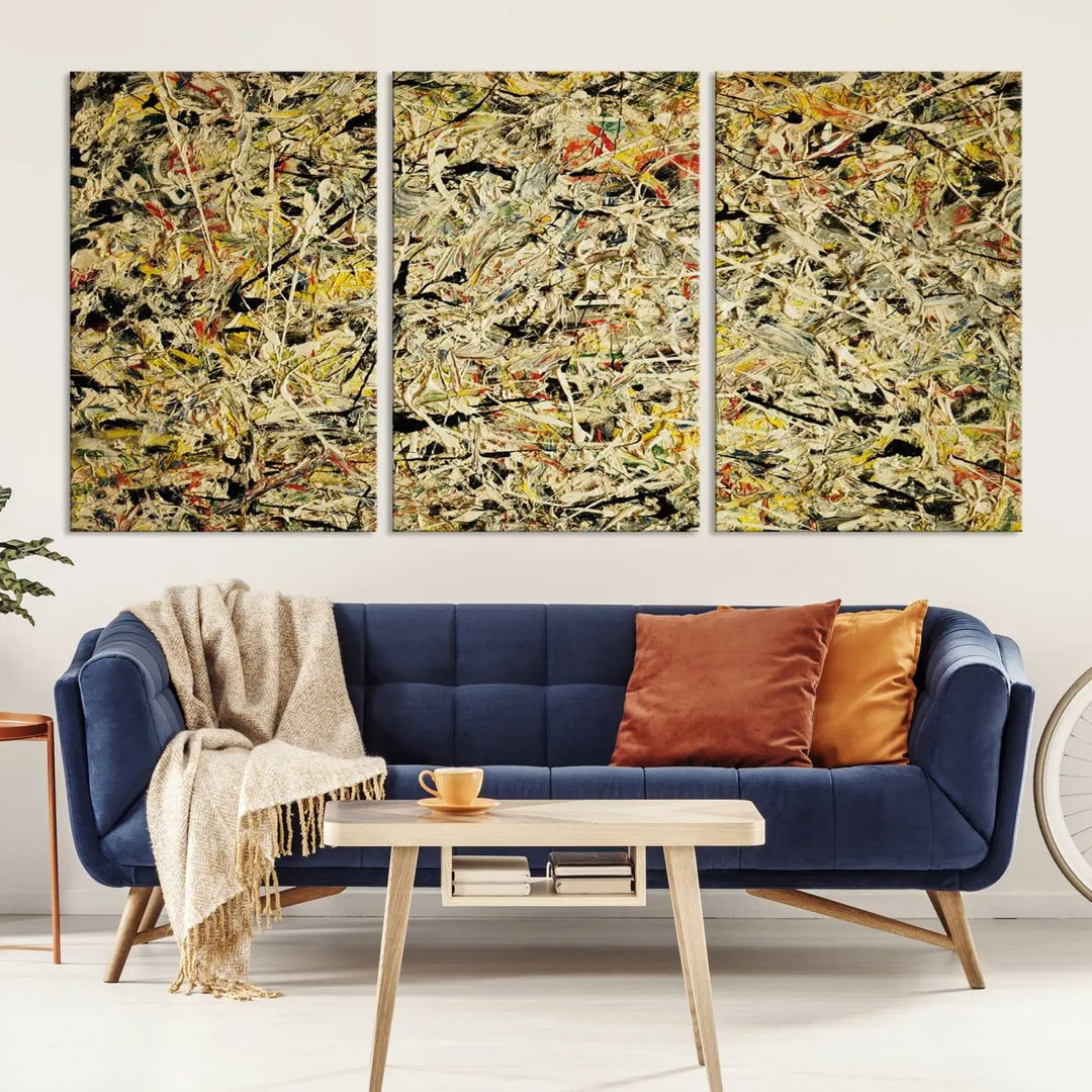 A Jackson Pollock Yellow Abstract Wall Art Canvas Print, featuring chaotic splashes of black, yellow, and red on a museum-quality canvas, is displayed prominently.