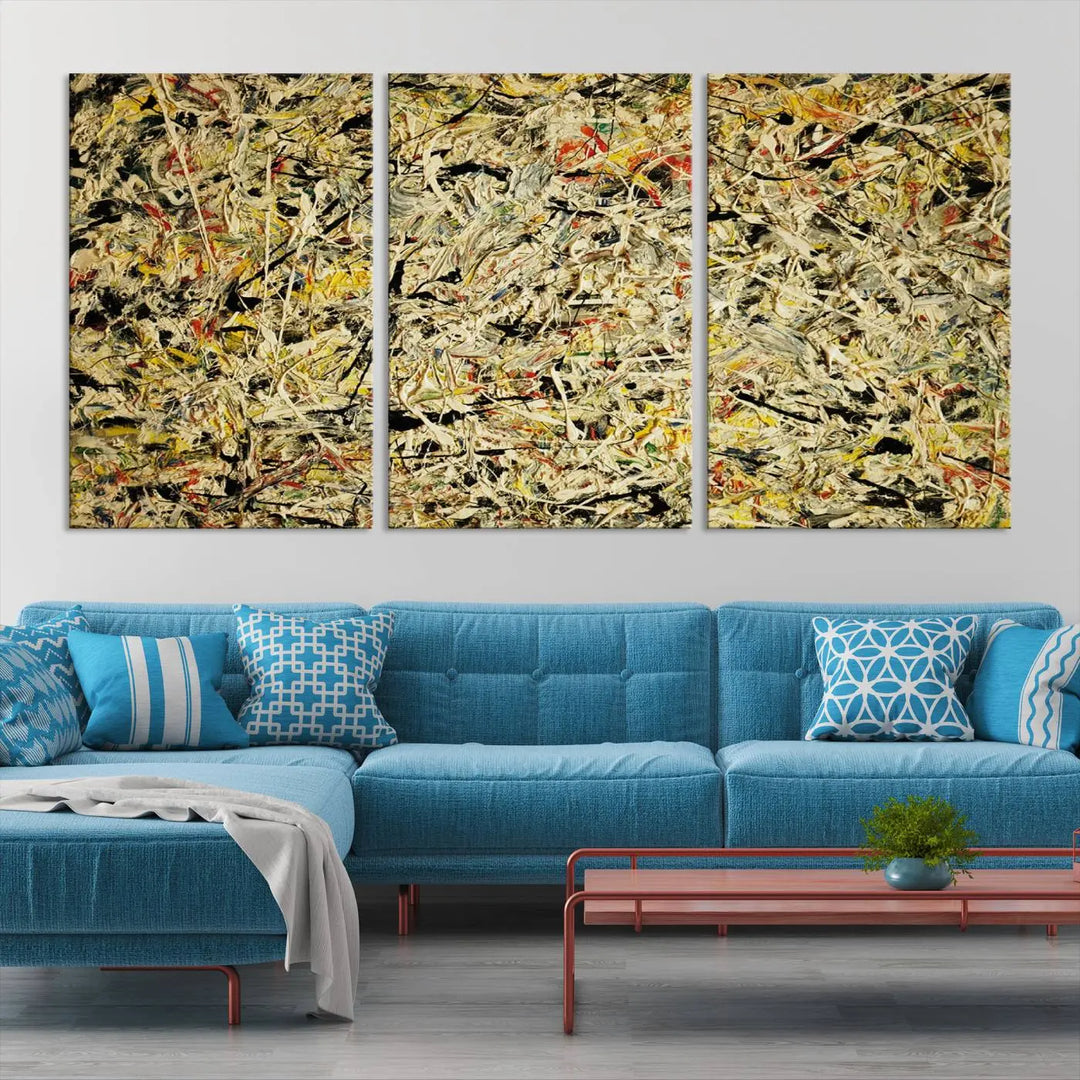 A Jackson Pollock Yellow Abstract Wall Art Canvas Print, featuring chaotic splashes of black, yellow, and red on a museum-quality canvas, is displayed prominently.