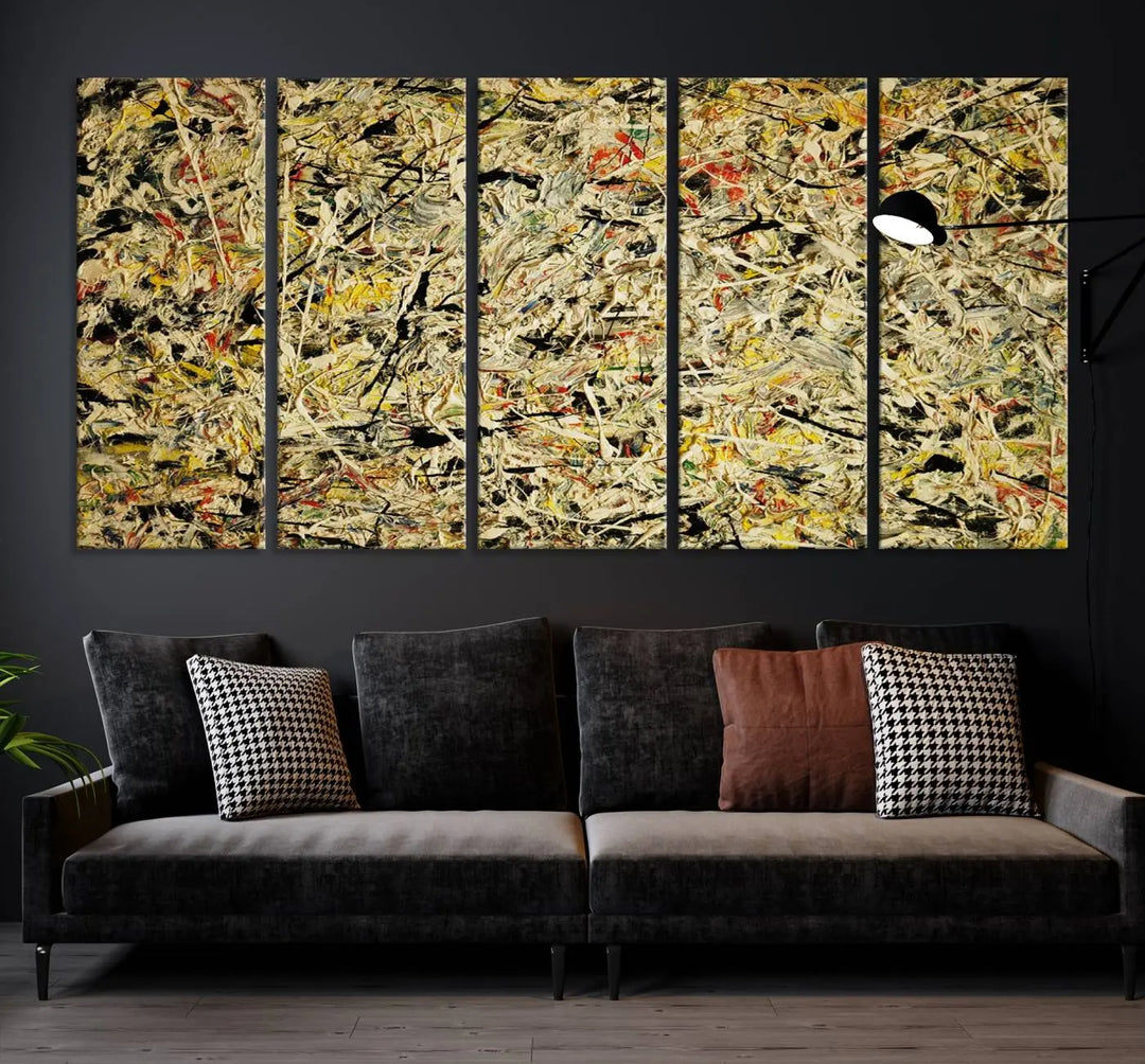 A Jackson Pollock Yellow Abstract Wall Art Canvas Print, featuring chaotic splashes of black, yellow, and red on a museum-quality canvas, is displayed prominently.