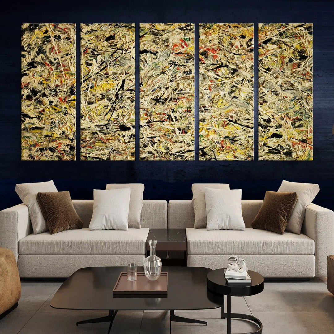 A Jackson Pollock Yellow Abstract Wall Art Canvas Print, featuring chaotic splashes of black, yellow, and red on a museum-quality canvas, is displayed prominently.