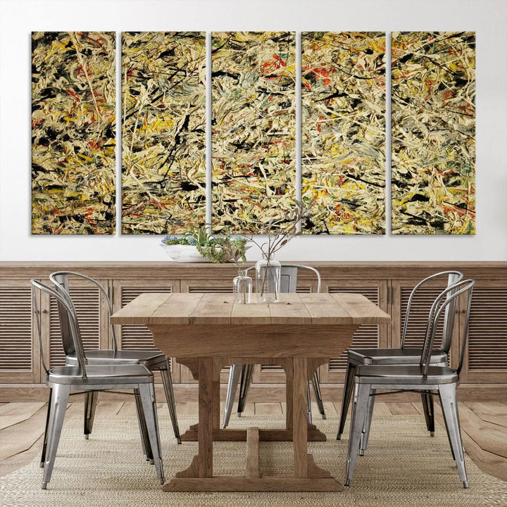 A Jackson Pollock Yellow Abstract Wall Art Canvas Print, featuring chaotic splashes of black, yellow, and red on a museum-quality canvas, is displayed prominently.