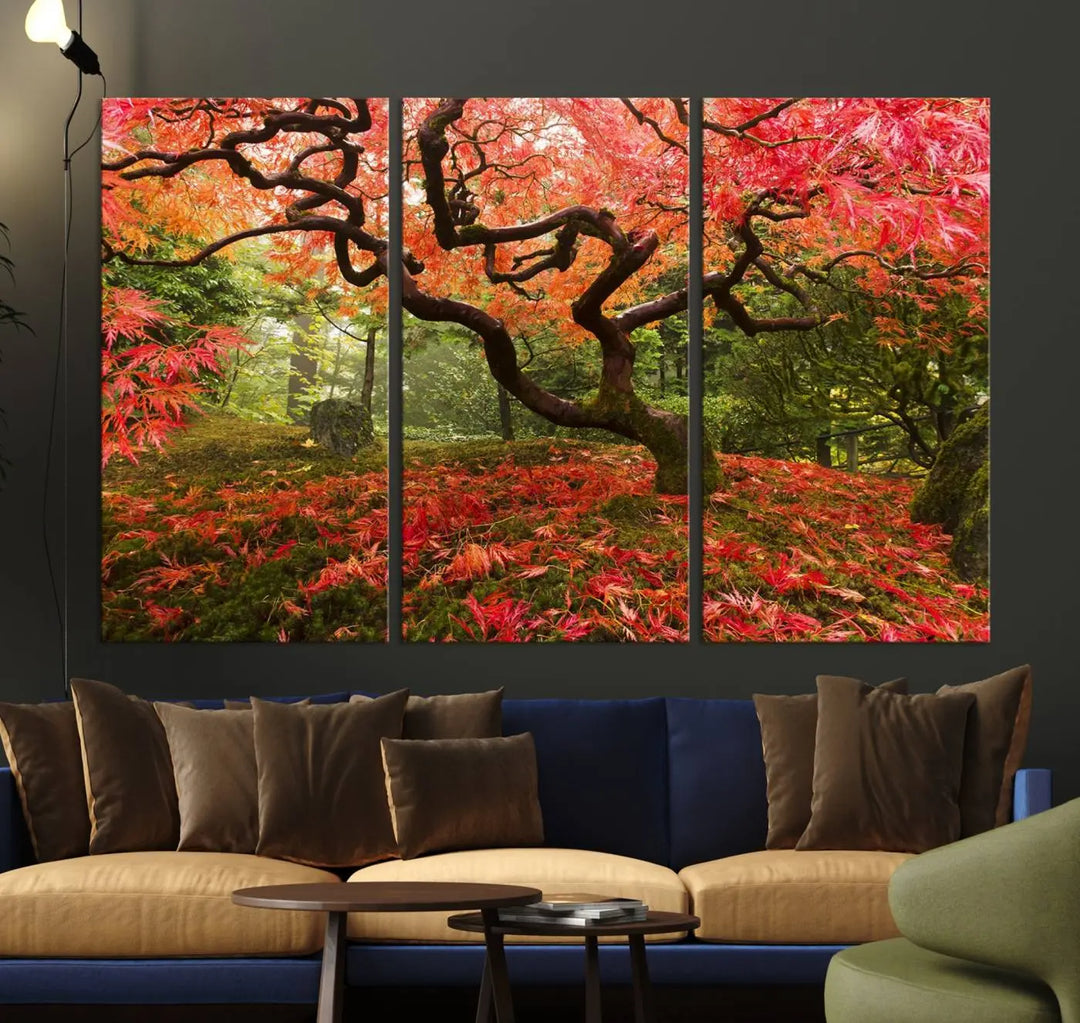 A modern living room features a triptych of the "Japanese Maple in Autumn Japanese Garden Portland Oregon Wall Art Canvas Print," elegantly displayed on museum-quality canvas.