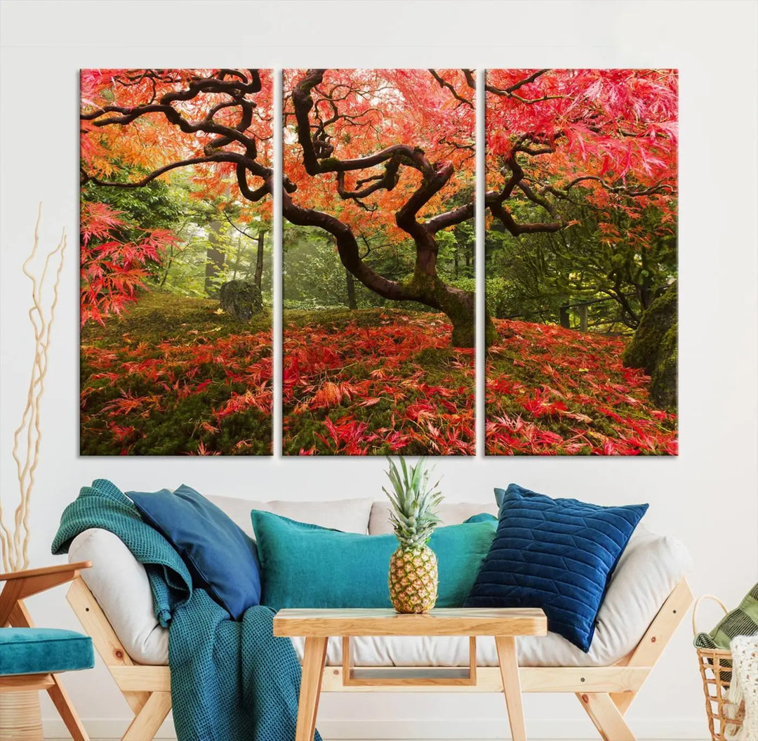 A modern living room features a triptych of the "Japanese Maple in Autumn Japanese Garden Portland Oregon Wall Art Canvas Print," elegantly displayed on museum-quality canvas.