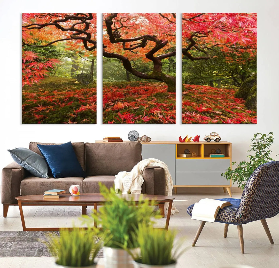 A modern living room features a triptych of the "Japanese Maple in Autumn Japanese Garden Portland Oregon Wall Art Canvas Print," elegantly displayed on museum-quality canvas.