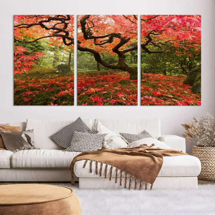 A modern living room features a triptych of the "Japanese Maple in Autumn Japanese Garden Portland Oregon Wall Art Canvas Print," elegantly displayed on museum-quality canvas.