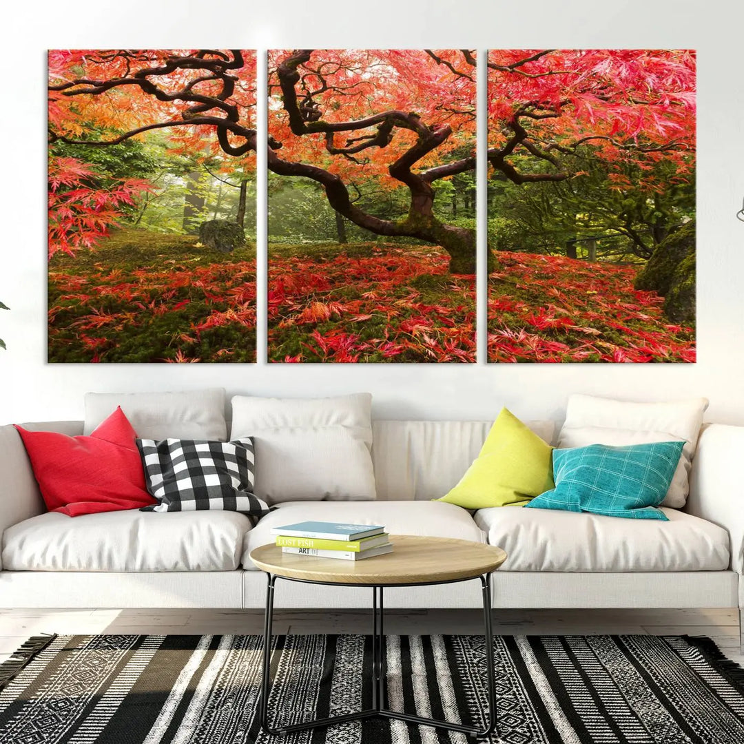 A modern living room features a triptych of the "Japanese Maple in Autumn Japanese Garden Portland Oregon Wall Art Canvas Print," elegantly displayed on museum-quality canvas.