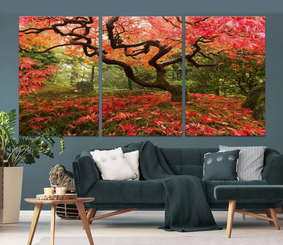 A modern living room features a triptych of the "Japanese Maple in Autumn Japanese Garden Portland Oregon Wall Art Canvas Print," elegantly displayed on museum-quality canvas.