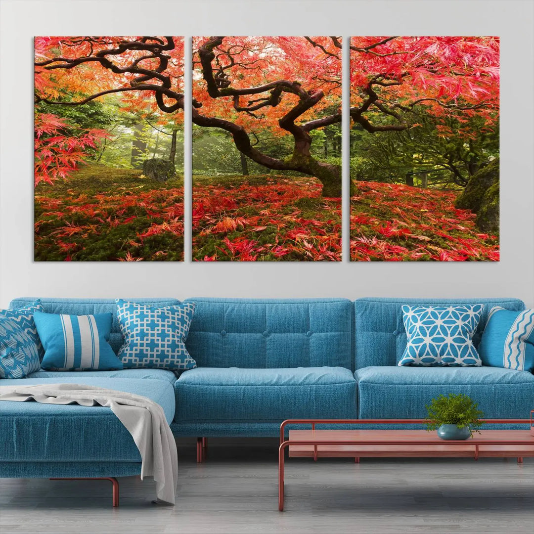 A modern living room features a triptych of the "Japanese Maple in Autumn Japanese Garden Portland Oregon Wall Art Canvas Print," elegantly displayed on museum-quality canvas.