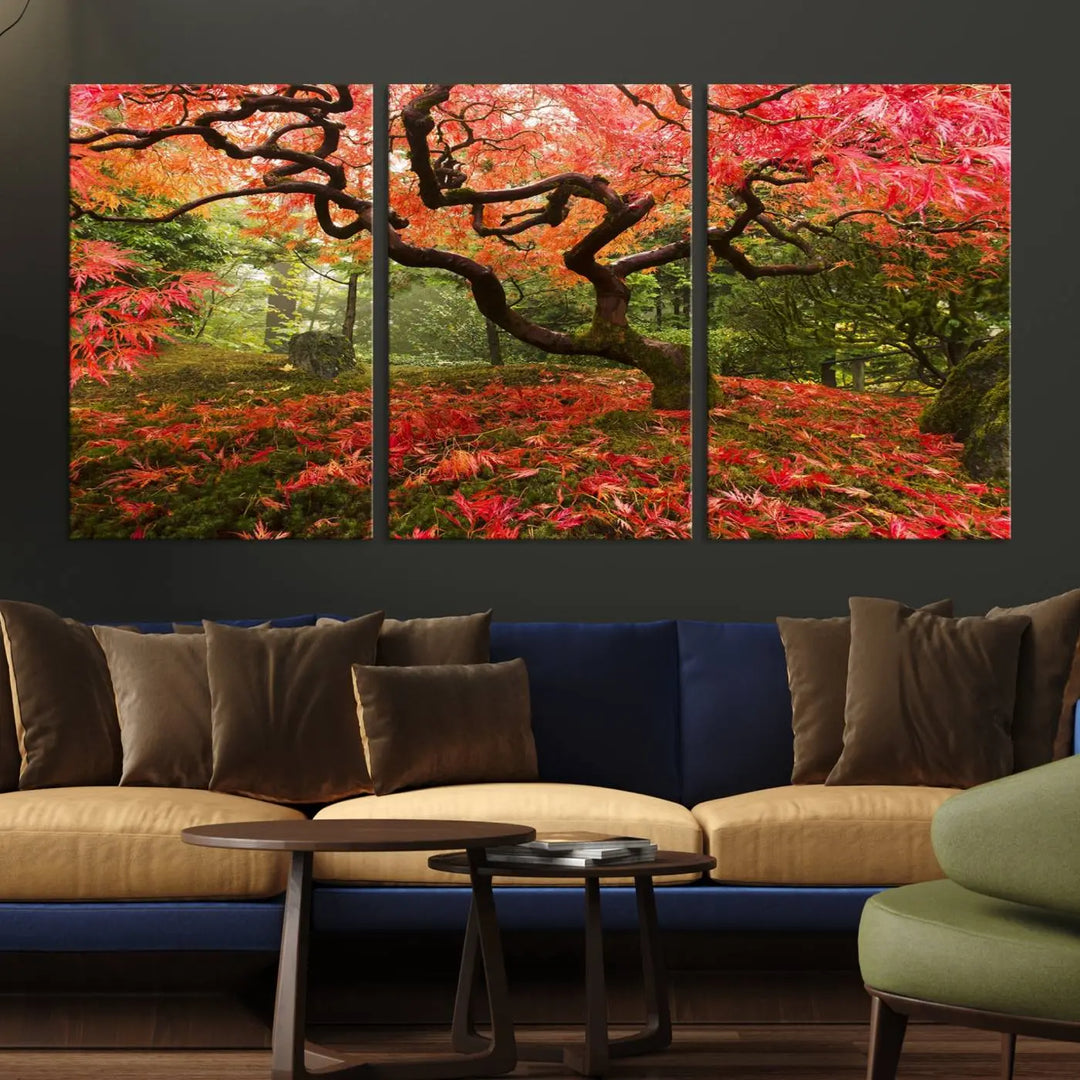 A modern living room features a triptych of the "Japanese Maple in Autumn Japanese Garden Portland Oregon Wall Art Canvas Print," elegantly displayed on museum-quality canvas.